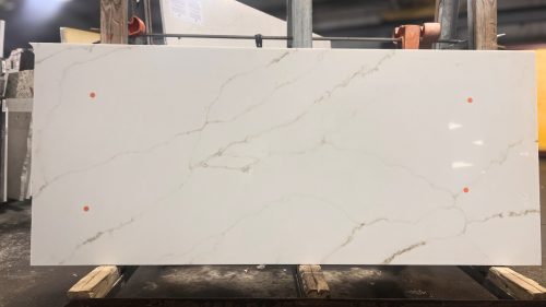 Orange stickers on a stone slab